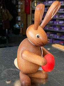 Ore mountain Hand made  Wooden Tall Easter Bunny Holding Egg Red 4.75" - German Specialty Imports llc