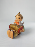 110/0 Hummel Goebel Concertina Playing Boy Figurine - German Specialty Imports llc