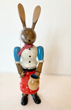 Ore mountain Painted  Hand made Wooden Tall Easter Bunny Woman with Paintbrush and Pot - German Specialty Imports llc