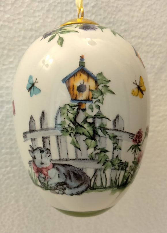27958 Dekor 726040 Hutschenreuther Porcelain Medium - Midi Easter Egg Ornament  “Kaetzchen liegend - Kitty laying ” Mi - German Specialty Imports llc