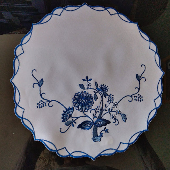Round Doily with embroidered Blue on white Flower with blue edging 10