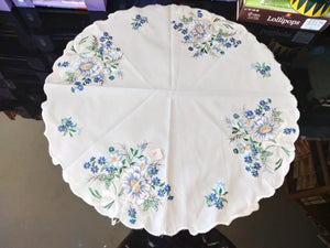 Plauener Spitze Round Doily with embroidered Multiple Blue a/ white Flowers with white  edging 19" - German Specialty Imports llc
